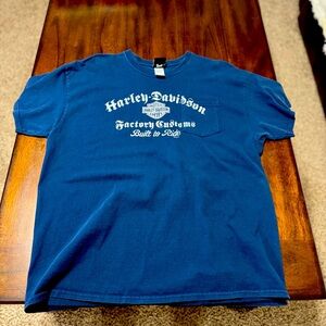 Men’s blue and white Harley Davidson T-shirt.